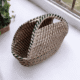 Handcrafted Sabai grass utility basket with woven handle design