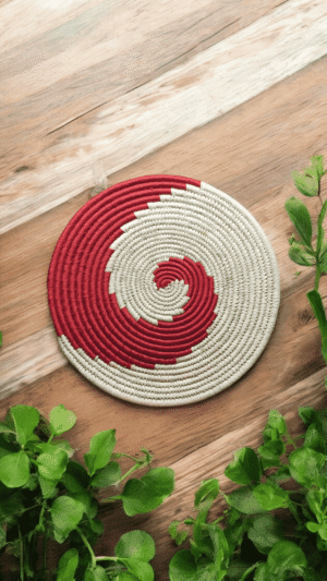 Crimson Spiral Sabai Grass Placemat Crimson Spiral Sabai Grass Placemat with red and white handcrafted woven pattern