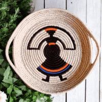 Handwoven Sabai grass decorative basket with tribal round woven design