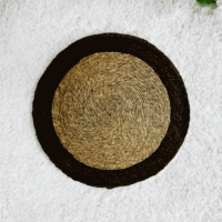 Earthy Harmony Sabai Grass Placemat with natural woven texture and black border
