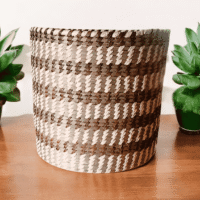 Handwoven Sabai grass storage basket with elegant checkered woven pattern