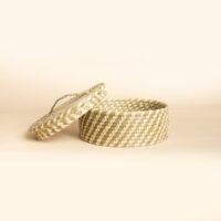 Handwoven Sabai grass storage basket with lid in natural checkered woven design