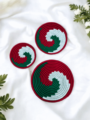 Sabai grass wall decor plate set with red green and white spiral woven design