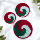 Sabai grass wall decor plate set with red green and white spiral woven design