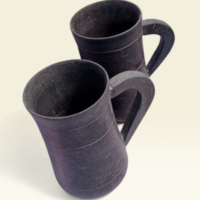 Black Granite Stone Mug Set Handcrafted black granite stone mugs for tea and coffee serving