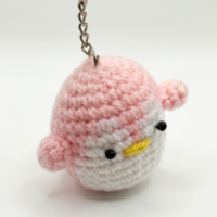 Handcrafted crochet penguin keychain made with soft yarn for bags and keys