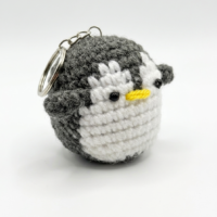 Handmade Crochet Penguin Keychain – Grey & White Amigurumi Charm Handmade grey and white crochet penguin keychain with soft amigurumi design