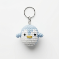 Handmade Crochet Blue Penguin Keychain – Cute Amigurumi Bag Charm Handmade crochet blue penguin keychain with soft amigurumi design