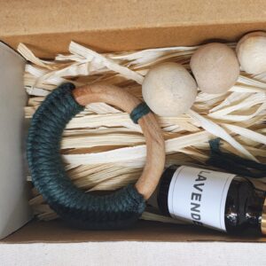 handcrafted macrame car essential oil diffuser hanging with wooden beads