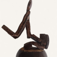 Handcrafted Coconut Shell Yoga Figurine Handcrafted coconut shell yoga figurine with rustic artisan finish