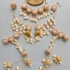 Handcrafted Floral & Cowrie Shell Wedding Jewelry