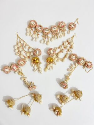 Floral Cowrie Shell Jewelry Set Handcrafted floral cowrie shell jewelry set with necklace earrings and maang tikka for haldi and mehendi