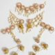 Floral Cowrie Shell Jewelry Set Handcrafted floral cowrie shell jewelry set with necklace earrings and maang tikka for haldi and mehendi