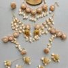 Handcrafted Floral & Cowrie Shell Wedding Jewelry