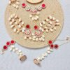 handcrafted floral cowrie shell jewelry set with necklace earrings for haldi mehendi bridal look