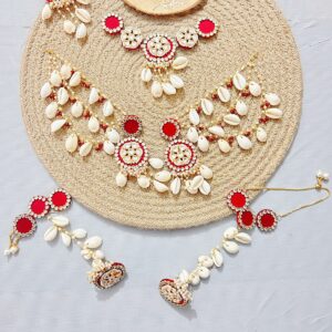 handcrafted floral cowrie shell jewelry set with necklace earrings for haldi mehendi bridal look