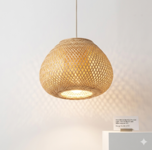 Handwoven natural cane pendant lamp with rounded woven design and warm ambient lighting