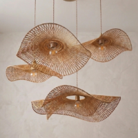 Cascade Cane Pendant Lamp Set – Handwoven Designer Hanging Lights Cascade handcrafted cane pendant lamp set with woven wave-shaped hanging lights