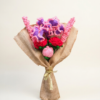 Blush Bloom Handmade Crochet Flower Bouquet Handmade crochet flower bouquet with pink, lavender, and red flowers wrapped in rustic fabric