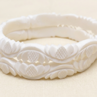 Traditional white Sankha bangles set with textured wave design