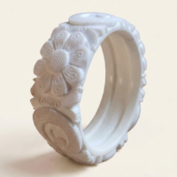 Traditional white Sankha bangle with embossed floral design
