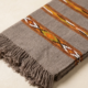 Grey handwoven cotton scarf with tribal woven stripes and tassels