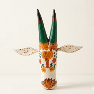Handcrafted ivory wooden bull mask wall decor with floral artwork and green horns
