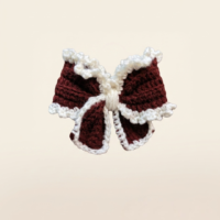 Snow Trim Crochet Bow Hair Clip Handmade Accessory Handmade brown and white crochet bow hair clip with fluffy trim