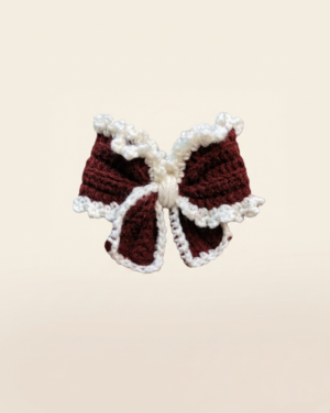 Handmade brown and white crochet bow hair clip with fluffy trim
