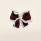 Handmade brown and white crochet bow hair clip with fluffy trim