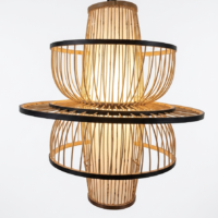 Handcrafted Orbit Harmony cane pendant lamp with layered circular design and natural woven cane structure